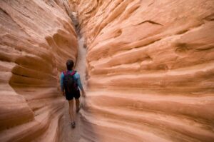 Hiker exploring rock formations